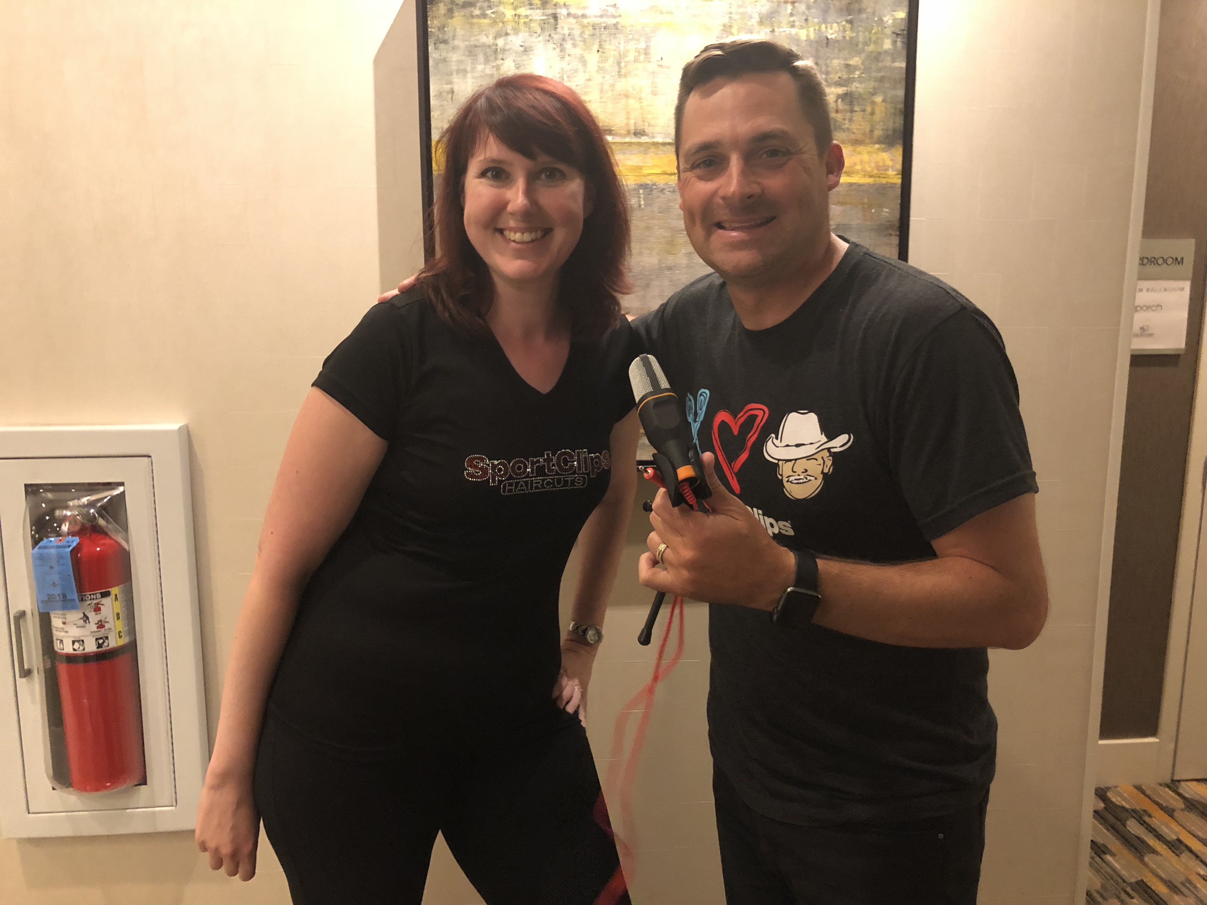 Linda Casillas and Chad Jordan with microphone